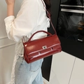 Dark red patent leather flap handbag with metal buckle and adjustable strap - Red