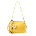Minimalist bright yellow square handbag with a decorative floral charm and gold hardware - Yellow