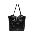 Bolso tote grande negro acolchado con decoraciones de estrellas doradas y asas largas - Negro
