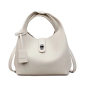 Minimalistische beige emmertas van generfd leer met handvat en zilveren gespsluiting - Broken Wit