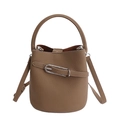 Brown bucket bag in pebbled leather featuring a top handle and adjustable shoulder strap - Gray