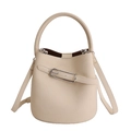 Chic cream white bucket bag in lychee texture with top handle and crossbody strap - White