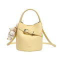 Pale yellow pebbled leather bucket bag with teddy bear charm and top handle - Yellow