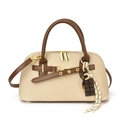 Beige canvas shell handbag with brown leather trim and chocolate charm detail - With Pendant / Off White