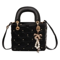 Black quilted handbag with star rivets and pearl charm for crossbody or hand carry - Black
