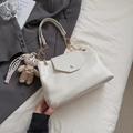 Ivory minimalist shoulder bag in pleated glossy leather with a stylish teddy bear charm - With Pendant / White
