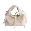 Creamy beige bow handbag in lychee texture leather with knot handle and silver hardware - White