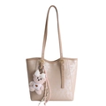 Minimalist beige leather tote bag for women featuring a cute plush bear pendant - With Pendant / Ginger