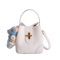 Chic beige lychee textured bucket handbag with gold twist lock and a cute bear charm - With Charm / White