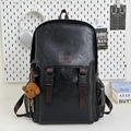 Fashionable black faux leather backpack with brown straps and cute plush dog charm - With Pendant / Black