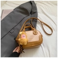 Chic two-tone beige and brown textured crossbody bag with a cute star charm - Pink With Pendant
