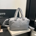 Quilted light grey puffer tote bag with soft padded handles and crossbody strap - Gray