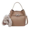 Chic camel brown pebbled leather bucket bag with silver hardware and plush bunny charm - With Pendant / Khaki