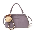 Purple textured crossbody bag with plush bear charm and beaded strap detail - With Pendant / Purple