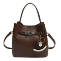 Deep brown lychee grain leather bucket bag with top handle and horse charm - With Charm / Brown