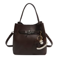 Close-up of dark brown lychee grain leather bucket bag with silver metal twist lock - With Charm / Brown