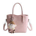 Pink minimalist bucket handbag with detachable strap and cute plush doll charm - With Charm / Pink