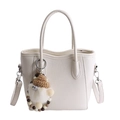 White leather bucket bag with top handles and a cute plush doll pendant charm - With Charm / White