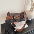 Vintage shoulder bag featuring black woven texture with brown leather and metal chain - Brown