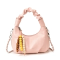 Chic pink dumpling bag with pleated handle, bead charm, and silver chain strap - Pink