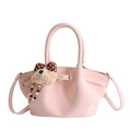Chic light pink bucket bag in textured finish with cute plush dog charm accessory - With Charm / Pink
