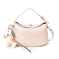 Pink top handle crossbody bag with decorative pony charm and gold twist lock closure - With Pendant / Pink