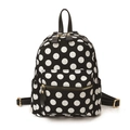 Classic black and white polka dot canvas backpack with premium gold metal zippers - Black