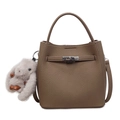 Brown litchi leather bucket handbag with silver lock and a cute grey bunny charm - With Pendant / Coffee