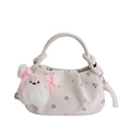 Chic cream dumpling bag with floral pattern and cute plush charm attachment - White