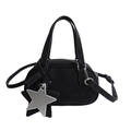 Chic black baguette bag in matte leather featuring distinctive star pendants and silver hardware - Black