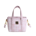 Light pink cartoon print bucket bag with cat motifs and gold plaque detail - Large / Pink