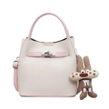 Schicke Eimer-Handtasche aus Leder in Beige und Rosa mit silbernem Drehverschluss und Hase - Mit Anhänger / Rosa