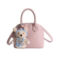 Pink shell-shaped handbag in lychee grain leather with a cute teddy bear pendant - Pink