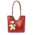 Glossy red tote bag with plush bear charm and textured leather finish in high shine - With Pendant / Red