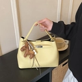 Sac seau en cuir jaune vif avec fermoir rotatif argenté et breloque cheval - Avec Pendentif / Jaune