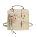 Retro cream beige backpack in faux leather featuring a teddy bear charm and silver buckles - With Pendant / Yellow