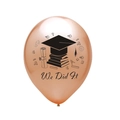 Detail of rose gold graduation balloon with black We Did It print and icons - Rose Gold