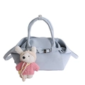 Light blue bucket bag with woven straps, metal buckles and cute bunny charm pendant - With Pendant / Blue