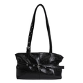 Chic black tote bag in glossy crinkled leather with silver buckle and eyelet details - Black