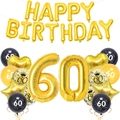 Flat lay of 60th birthday party kit with gold foil balloons and black latex decorations - 60th Birthday Set