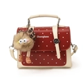Red and white polka dot handbag with cream handle and plush monster charm - With Pendant / White