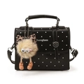 Minimalist black polka dot handbag with fuzzy pom-pom charm and adjustable strap - With Pendant / Black