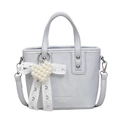 Mini light blue crossbody bucket bag with pearl heart charm and cylindrical handles - With Pendant / Blue
