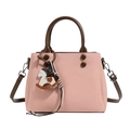 Pink twill handbag with brown leather straps and wooden rocking horse charm accessory - Pink