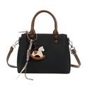 Retro black tote bag with brown handles and a cute white rocking horse charm - Black