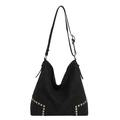 Black suede hobo bag with gold rivet studs and adjustable shoulder strap on white backdrop - Black