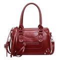 Dark red faux leather pillow bag with silver studs and long tassels in a variant view - Red