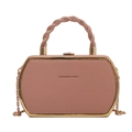 Chic pink hexagonal crossbody handbag with golden metal trim and chain strap - Pink