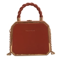 Chic orange octagonal crossbody bag with gold metal trim and a twisted top handle - Brown