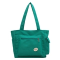 Grande borsa tote in tela verde smeraldo con tasca frontale a zip ed etichetta tonda - Verde